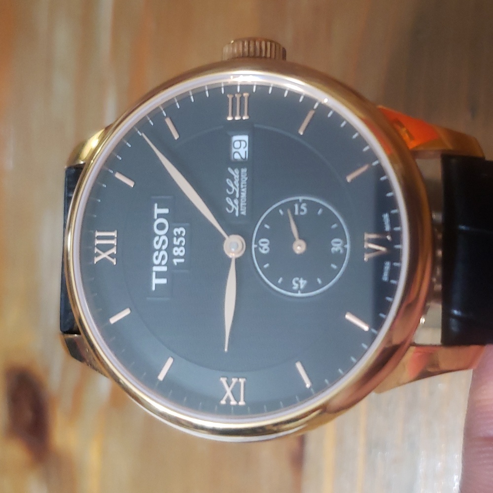 tissot 1853 le locle gold and black